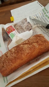 Gluten-free baguette and log of chevre cheese